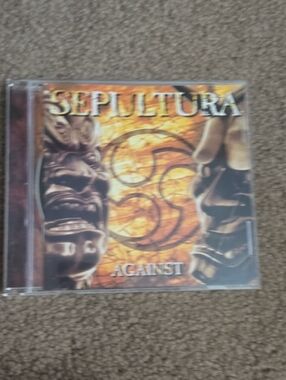 Sepultura "Against" CD - Orange Album Art